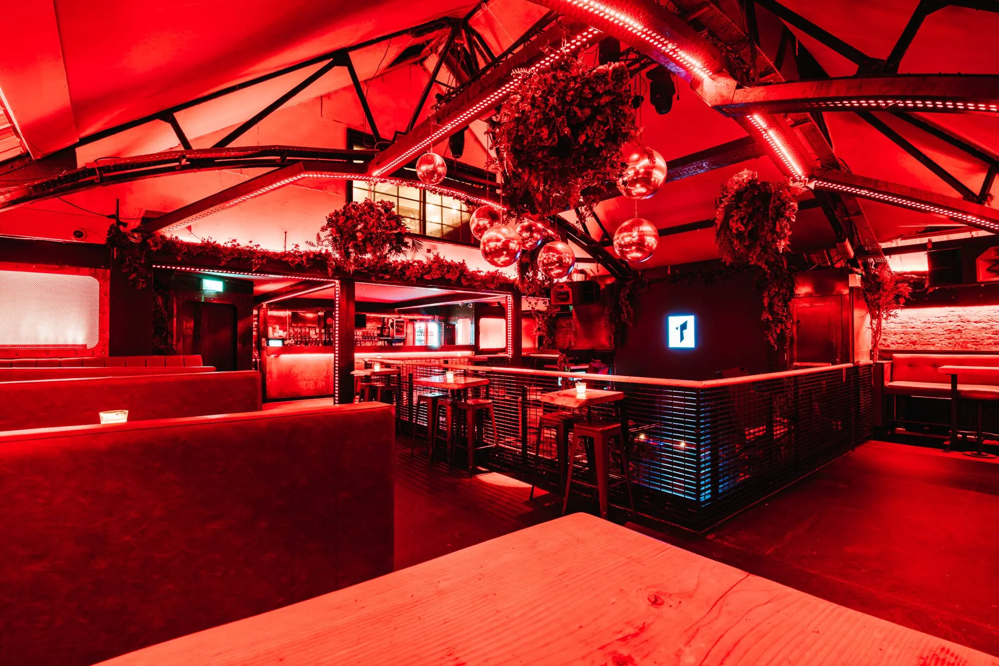 The Terrace at Thompsons, lit red, before the doors open