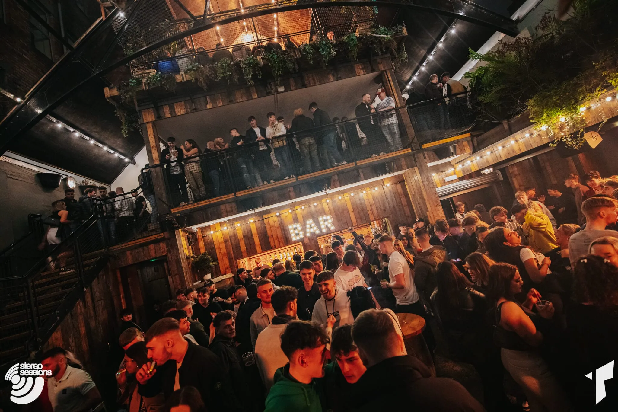 A packed room at Thompsons, looking towards the bar